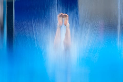 China's Chen Yuxi competes in women's 10m platform diving 